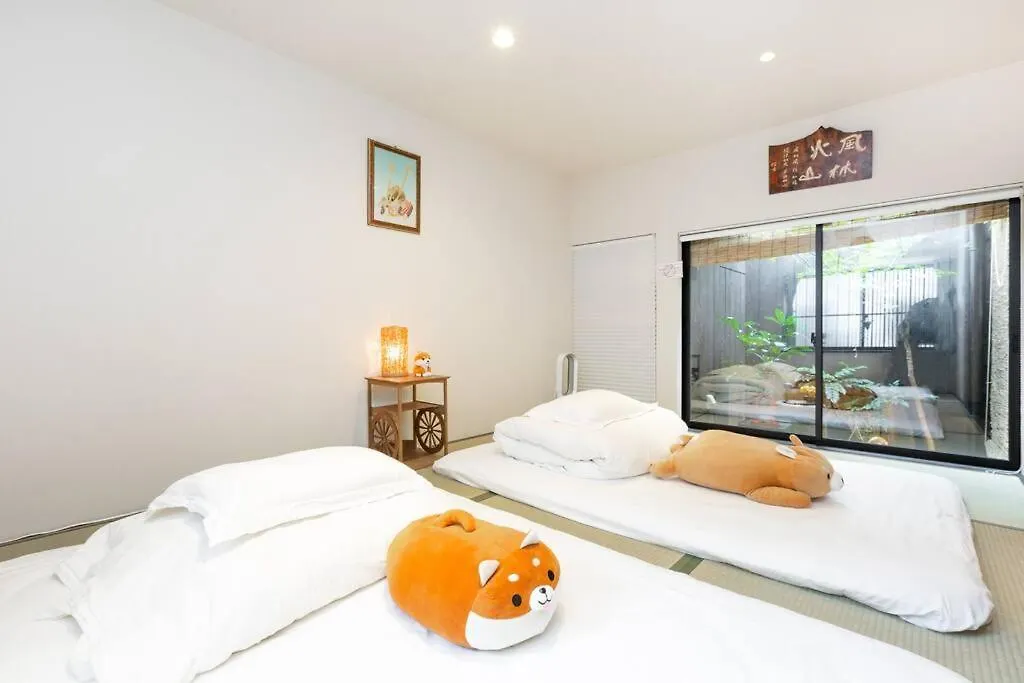 ゲストハウス至の宿 Shibainu-Themed Guesthouse Κιότο